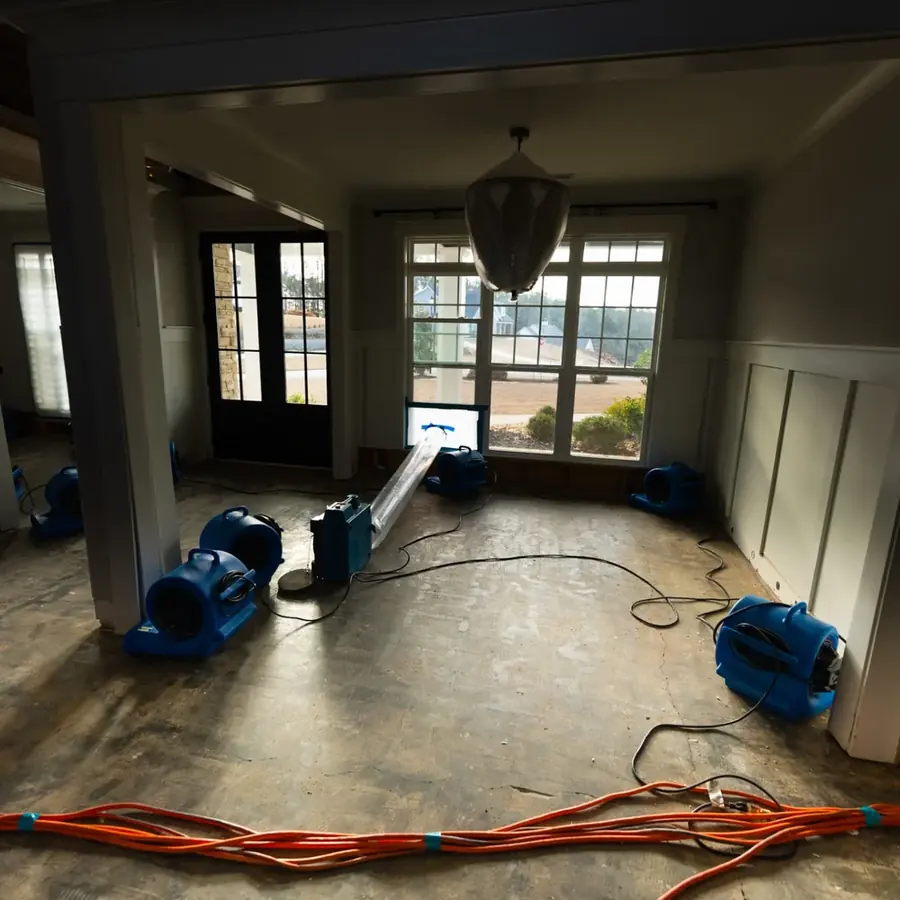Air movers finishing a structural dry-out in a Bronx, NY building